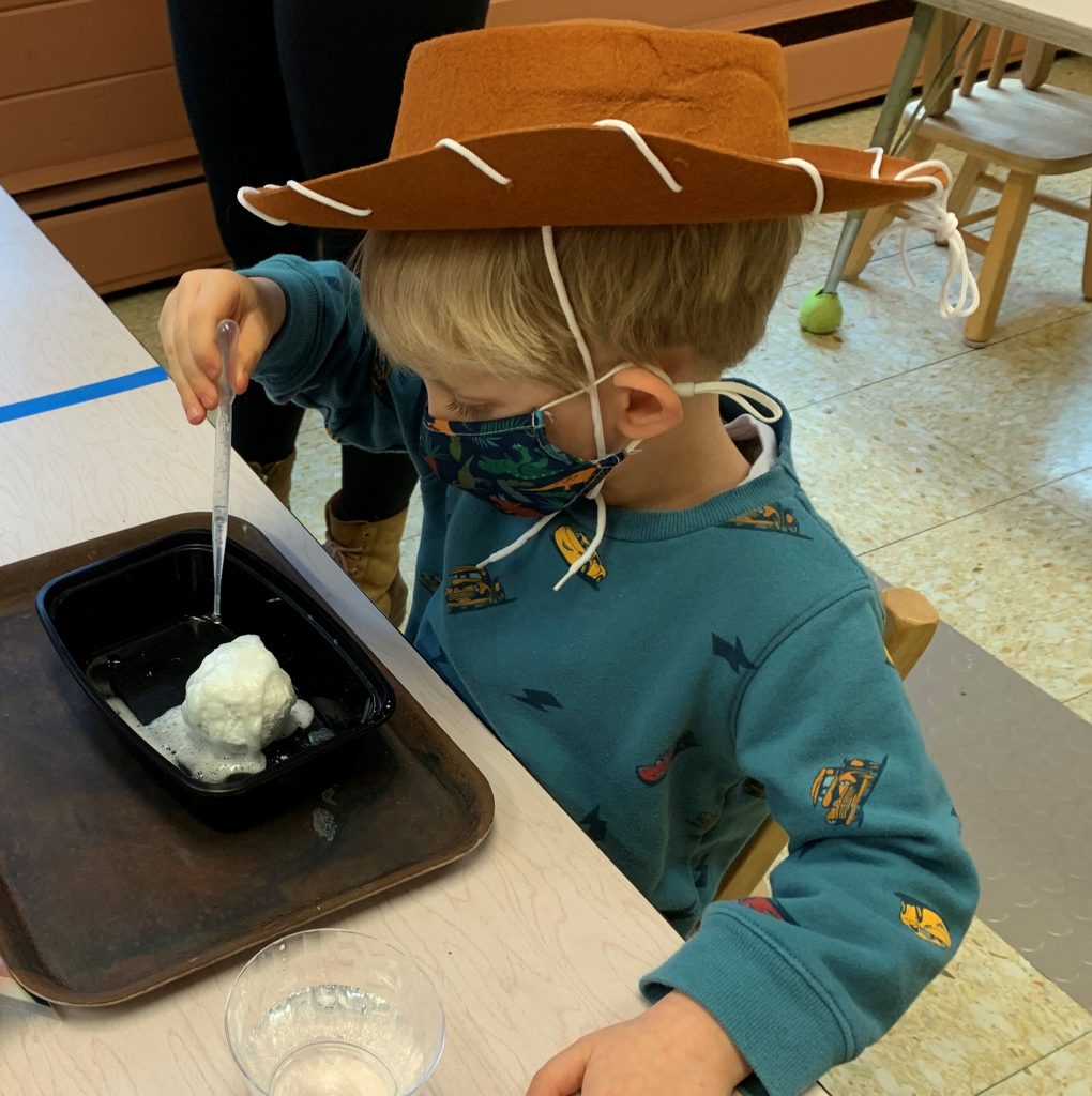 Boy with Hat in class