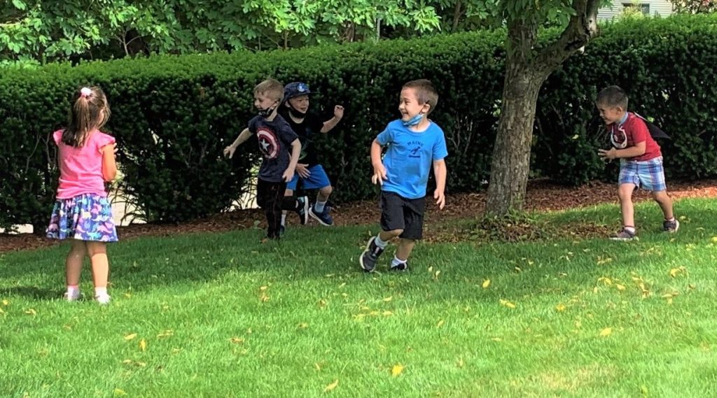 Children running in the garden